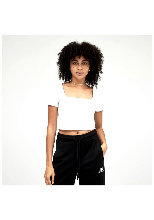 Жіноча футболка New Balance Athletics Amplified молочного кольору. Класичний крій, зручний матеріал та великий друкований логотип NB на грудях. Магазин LikeSport.