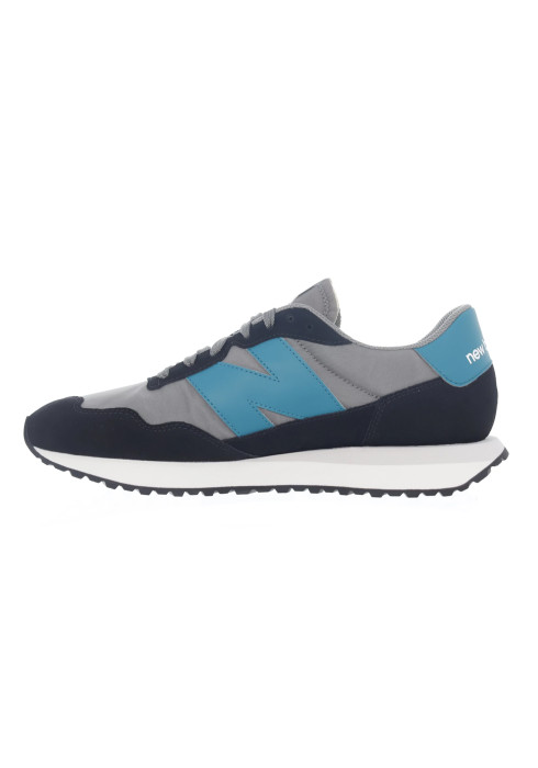Чоловічі кросівки New Balance 237 у профіль з внутрішньої сторони з сірим текстильним верхом та темними замшевими накладками