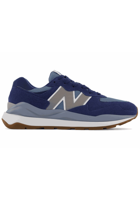 Чоловічі сині кросівки New Balance 5740 у профіль з сірим логотипом N та комбінованою підошвою