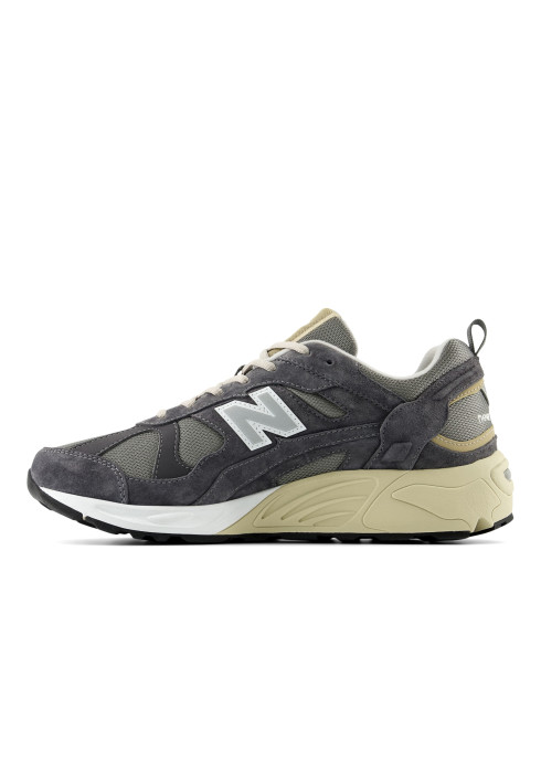 Кросівок унісекс New Balance 878 темно-сірого кольору у профіль із бежево-білою підошвою ABZORB та сірим логотипом N