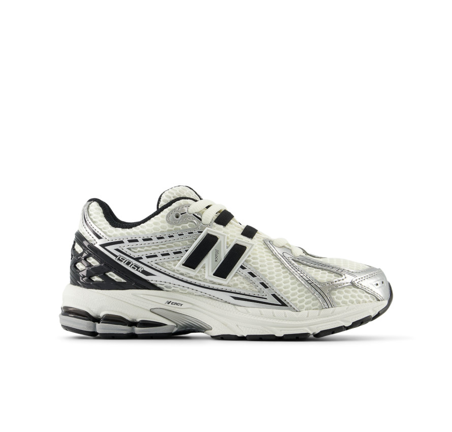 Юніорські кросівки New Balance 1906 у світло-сірому кольорі з технологічною підошвою
