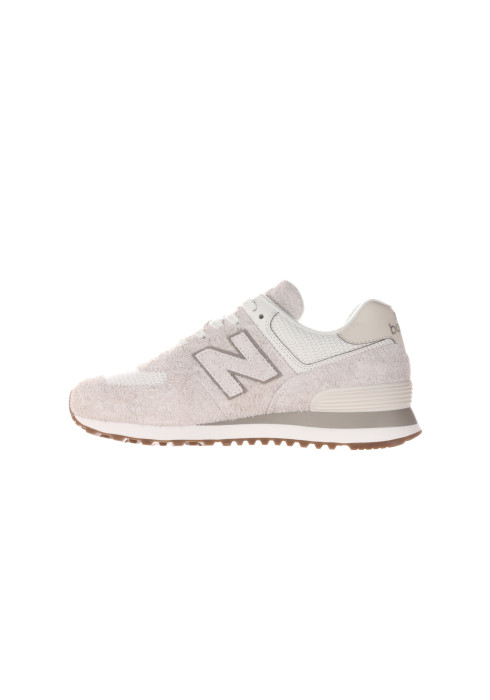 Жіночі бежеві кросівки New Balance 574 у профіль з внутрішньої сторони на м'якій підошві