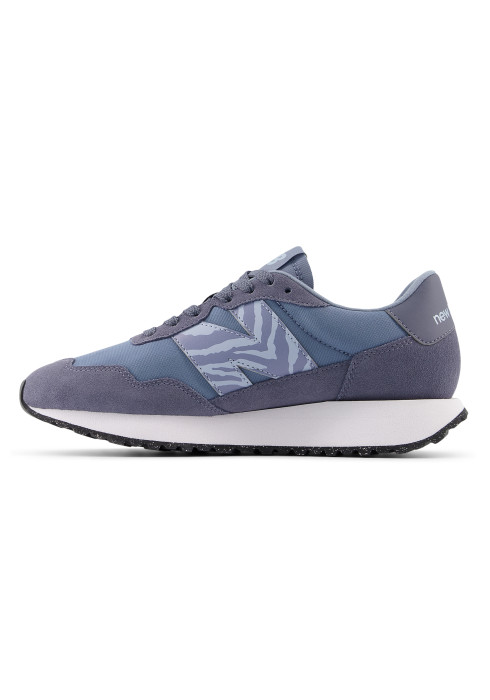 Жіночі сині кросівки New Balance 237 у профіль з внутрішньої сторони з білою підошвою
