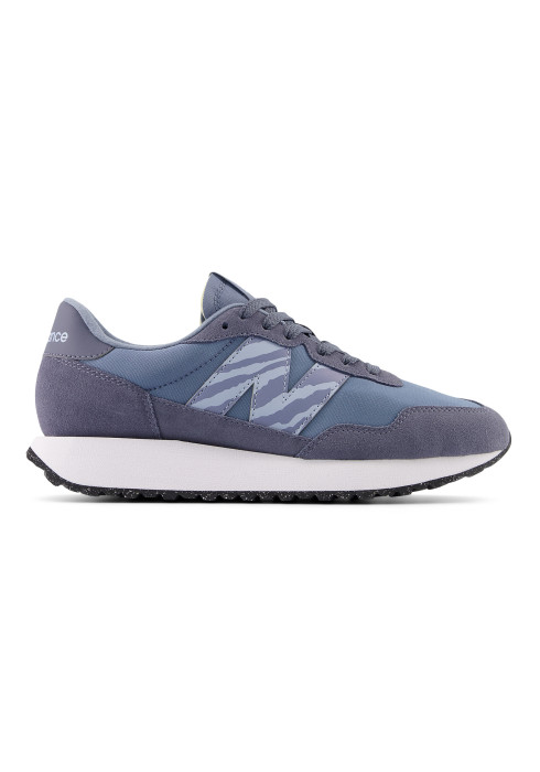Жіночі сині кросівки New Balance 237 у профіль з фірмовим візерунчастим логотипом N та замшевими вставками