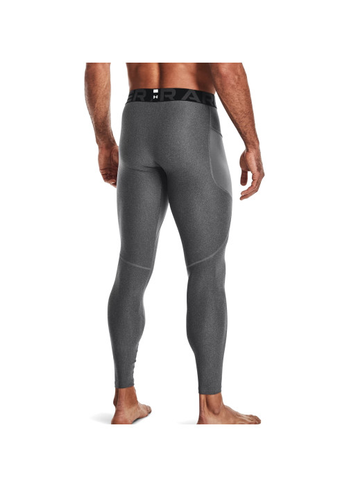 Чоловічі сірі компресійні легінси Under Armour HG Armor вид ззаду на моделі