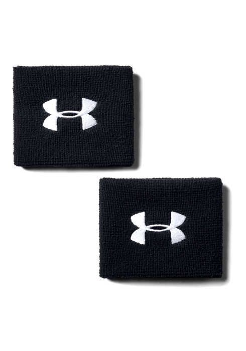Пара чорних та білих спортивних напульсників Under Armour з білим та чорним вишитим логотипом