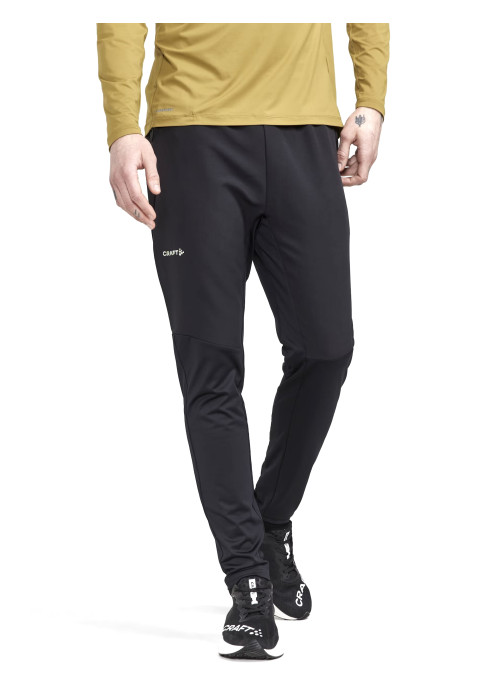 Чоловік у чорних спортивних штанах для тренувань Craft ADV HiT PANTS M студійний вигляд спереду на білому тлі