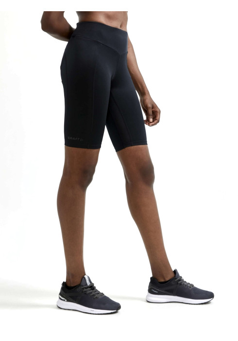 Жіночі короткі тайтси CRAFT ADV Essence Short Tights W арт. 1908778-999000 чорного кольору на моделі у профіль у повний зріст